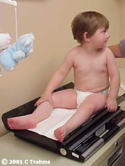 Child being weighed